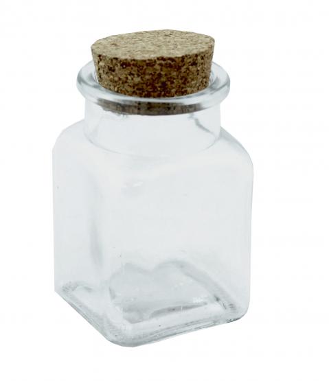 Pojemnik szklany z korkiem, znajduje zastosowanie w przechowywaniu różnych artykułów spożywczych.